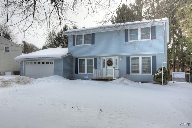 view of front of home with a garage