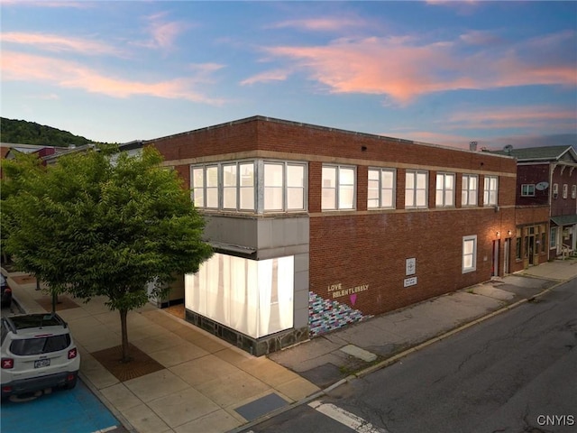 view of property at dusk