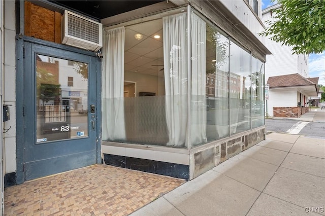 79-81 Main St, Sidney, NY 13838 - property entrance featuring an AC wall unit