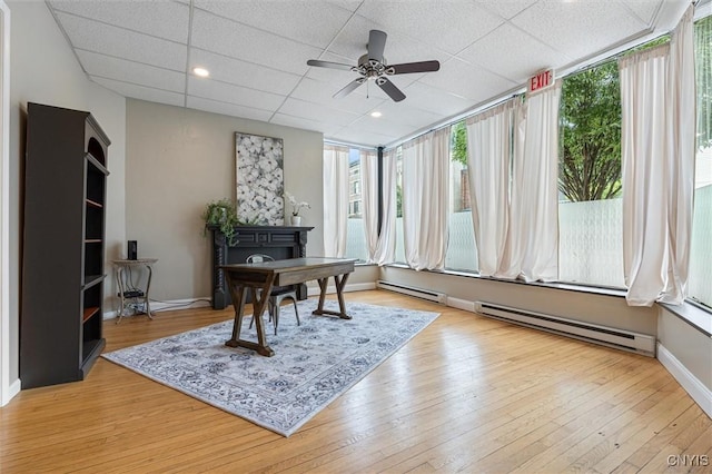 79-81 Main St, Sidney, NY 13838 - office area featuring a paneled ceiling, light wood finished floors, a baseboard radiator, and baseboards