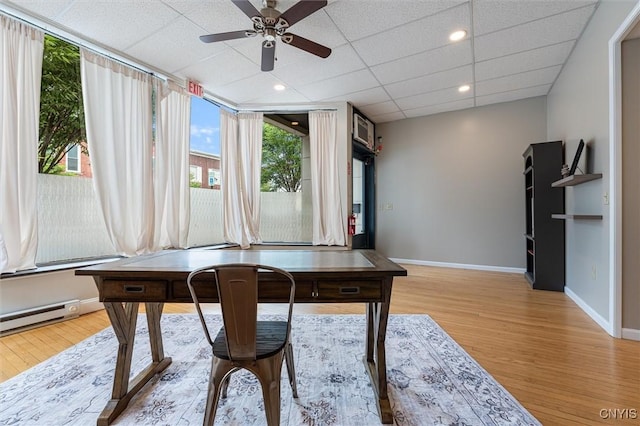79-81 Main St, Sidney, NY 13838 - office with baseboards, light wood-style flooring, baseboard heating, a paneled ceiling, and recessed lighting