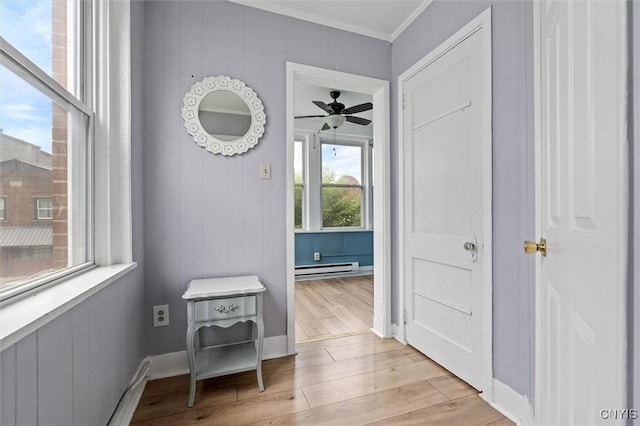 79-81 Main St, Sidney, NY 13838 - corridor with ornamental molding, light wood-type flooring, a baseboard radiator, and baseboards