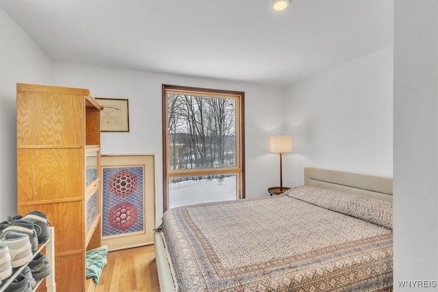 bedroom featuring wood finished floors