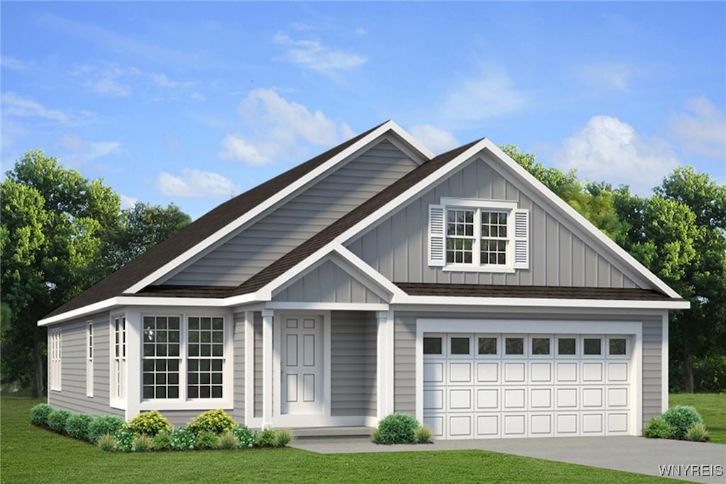 view of front facade with a garage, a front lawn, board and batten siding, and concrete driveway