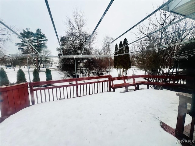 view of snow covered deck