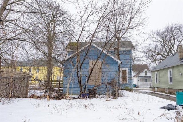 view of snow covered property