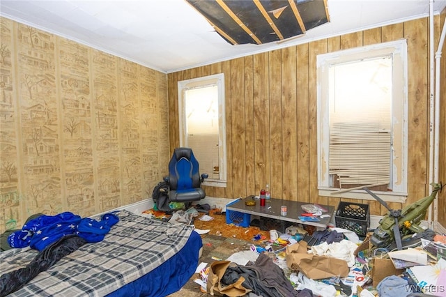 1511 13th St, Niagara Falls, NY 14305 - unfurnished bedroom with multiple windows, crown molding, and wood walls