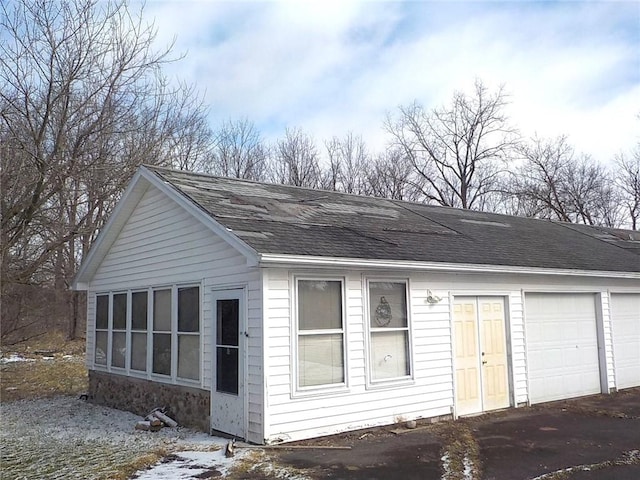 view of front of home with roof with shingles