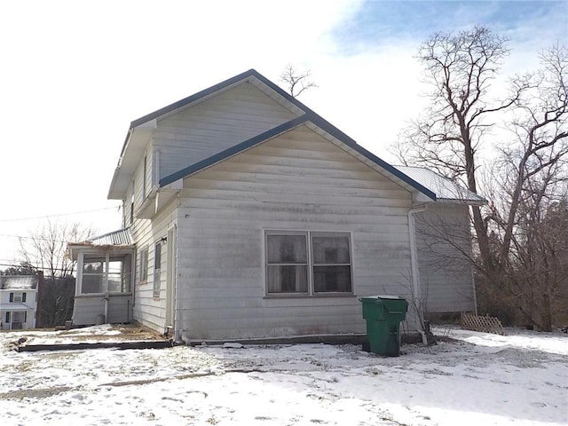 view of snow covered property