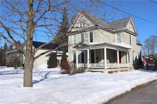 view of front of property featuring covered porch