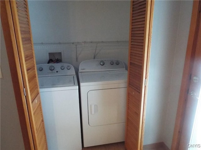 laundry room featuring laundry area and washer and clothes dryer