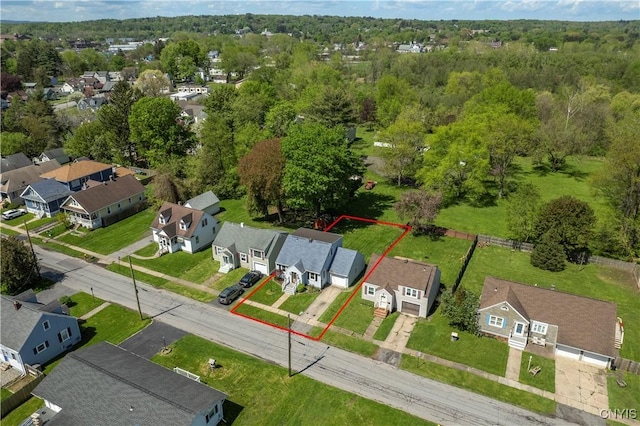 birds eye view of property with a residential view