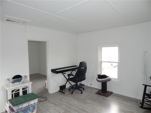 office featuring attic access and wood finished floors