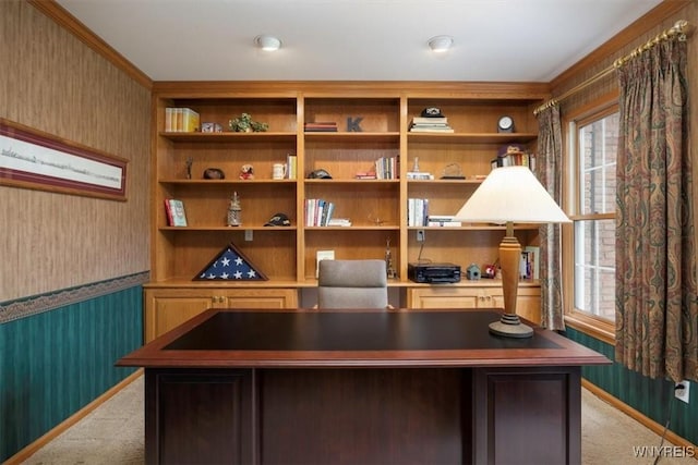 home office with wallpapered walls, wainscoting, and light colored carpet