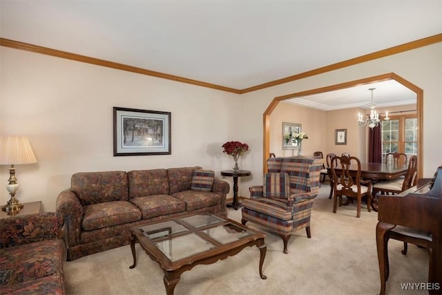 living area with a chandelier, light carpet, and crown molding