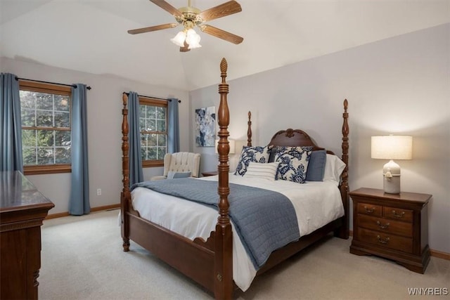 bedroom featuring lofted ceiling, baseboards, a ceiling fan, and light colored carpet