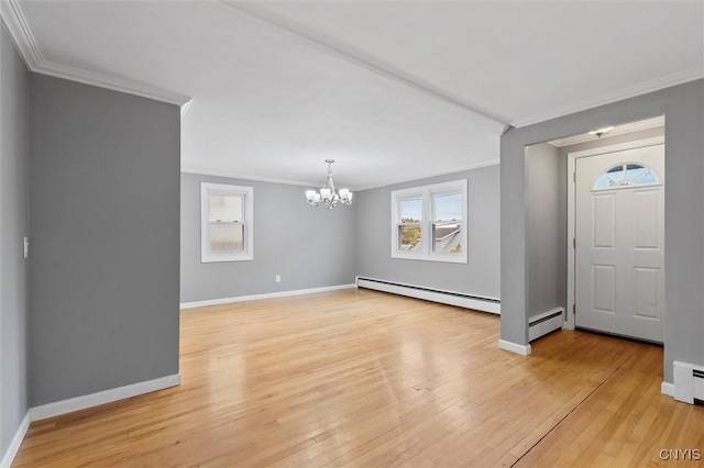 entryway with a baseboard heating unit, light wood-style floors, baseboards, and an inviting chandelier