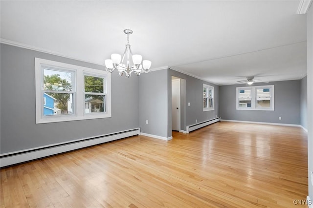 empty room with light wood-style floors, baseboards, and baseboard heating