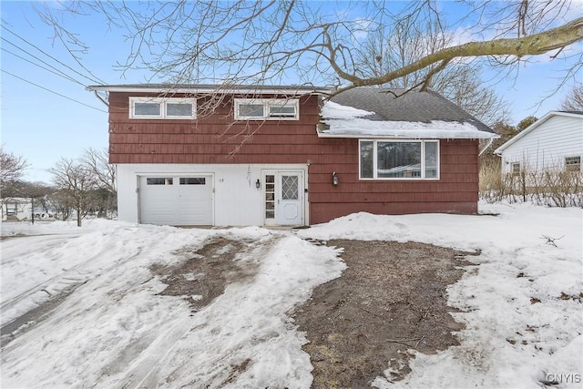 split level home featuring a garage