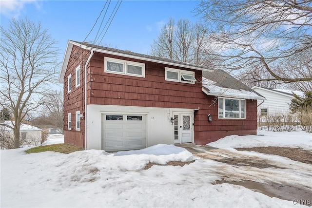 split level home featuring an attached garage