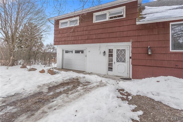 view of snow covered garage