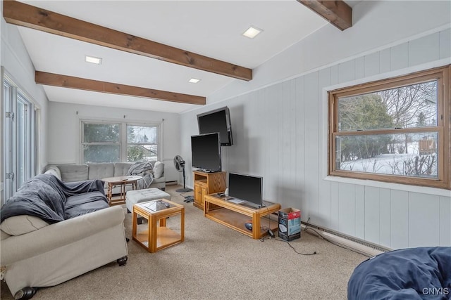 living area with carpet flooring, vaulted ceiling with beams, and baseboard heating