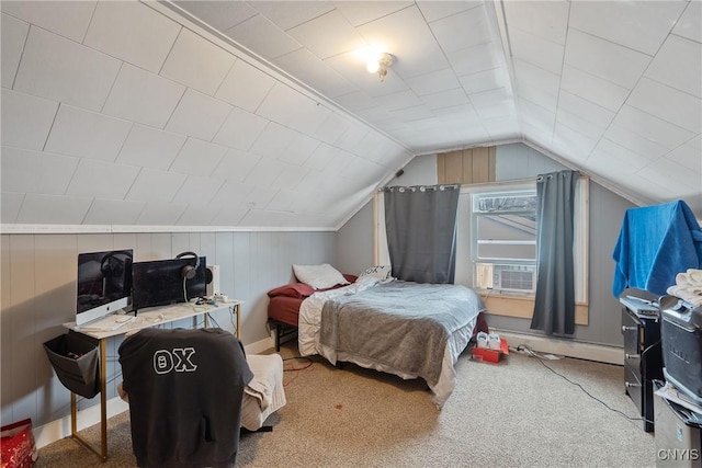 bedroom with lofted ceiling, carpet, and baseboard heating