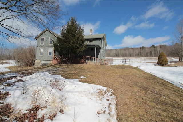 view of front of property featuring a chimney