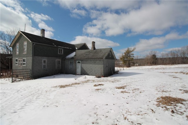 view of snow covered property