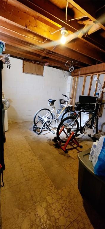 unfinished basement with tile patterned floors