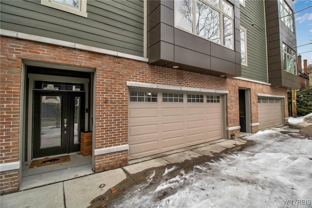 garage featuring driveway