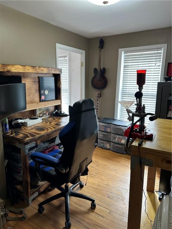 office space with light wood-type flooring