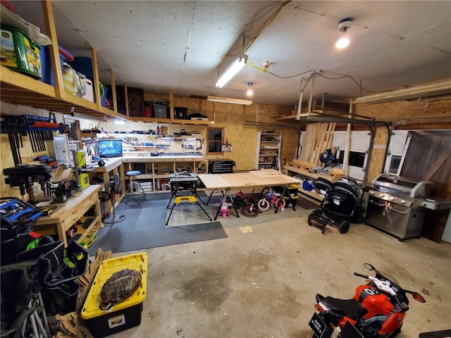 garage featuring a workshop area