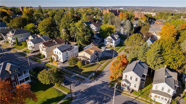 birds eye view of property with a residential view