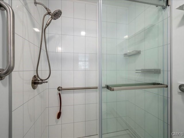 bathroom featuring a stall shower