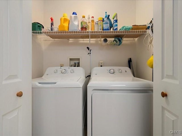 laundry area with washing machine and dryer and laundry area