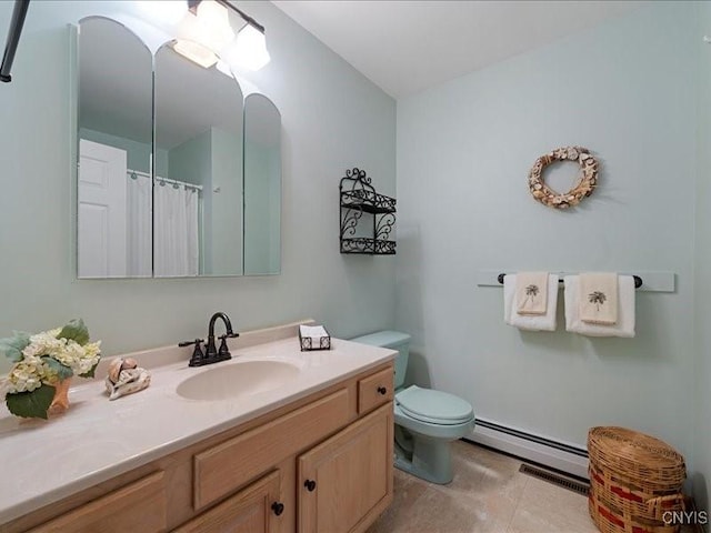 bathroom with toilet, curtained shower, tile patterned flooring, vanity, and a baseboard heating unit