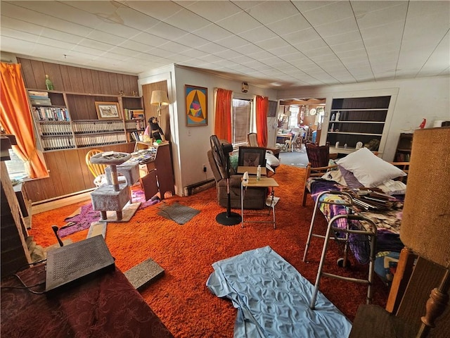 living room featuring carpet floors and built in features