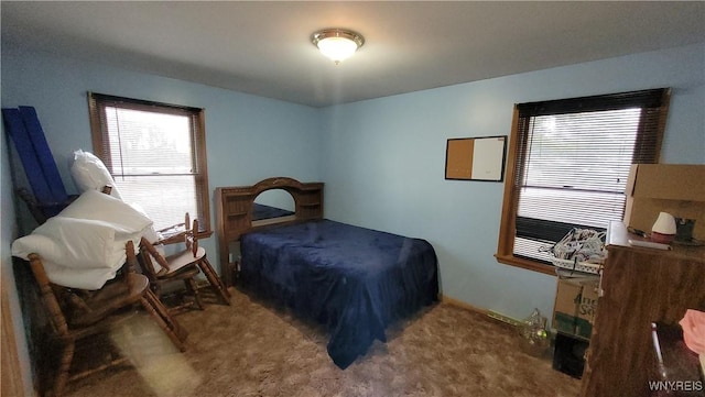 bedroom featuring carpet