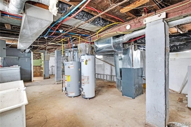 unfinished basement with gas water heater and heating unit