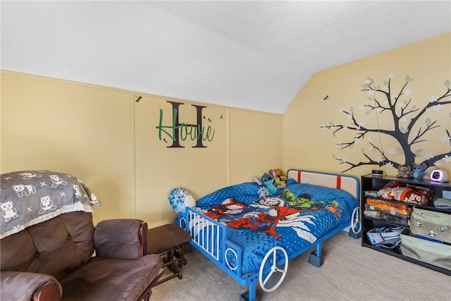 carpeted bedroom featuring lofted ceiling