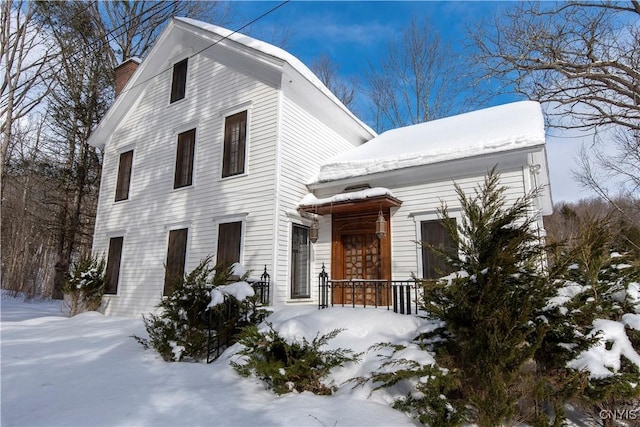 view of front of house with a chimney