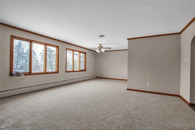 empty room featuring a baseboard heating unit, ornamental molding, arched walkways, and visible vents