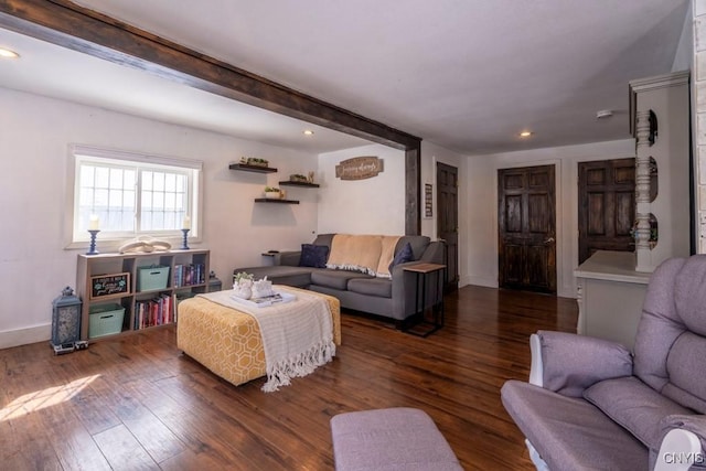 living area with dark wood-style floors, recessed lighting, beam ceiling, and baseboards