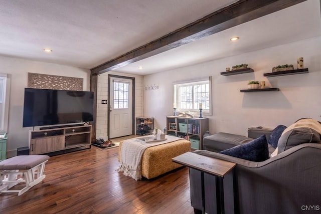 living area with dark wood finished floors, beamed ceiling, and recessed lighting