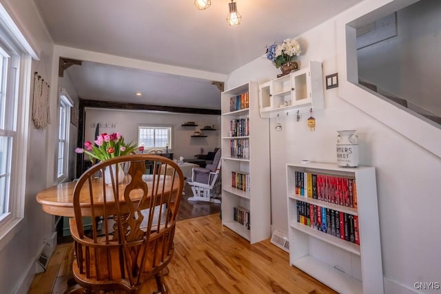 dining room with visible vents and light wood finished floors