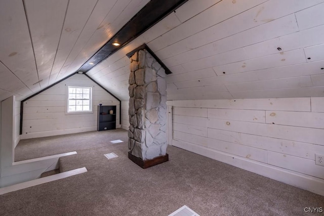 additional living space featuring carpet floors, wood ceiling, and vaulted ceiling