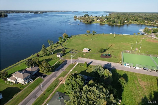 birds eye view of property with a water view