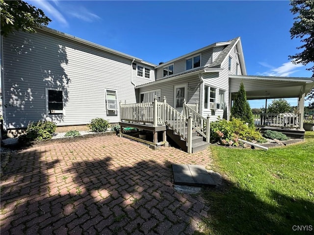 back of property with a patio area