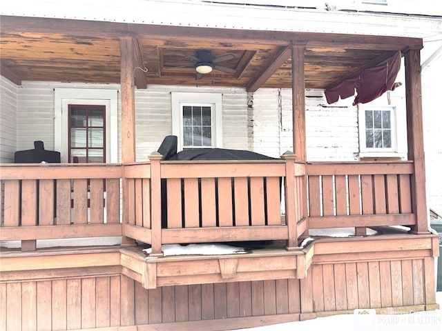 wooden deck with ceiling fan